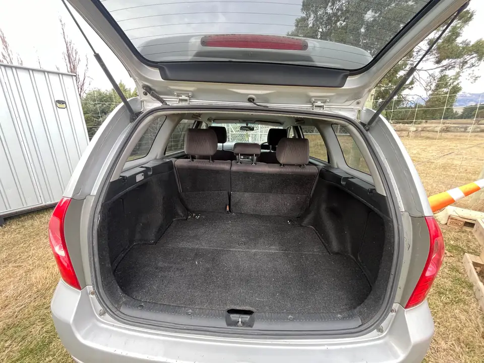Boot open with the tailgate raised and the rear seats upright