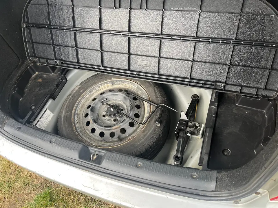 Close-up of the spare wheel and tool kit