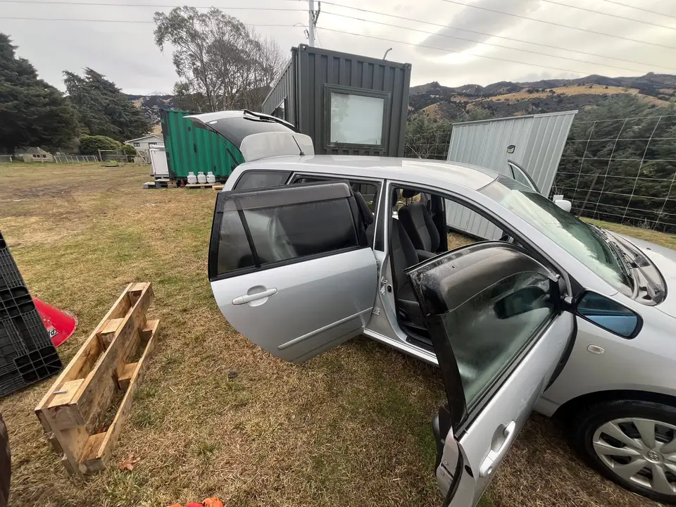 Side view with all four doors standing open