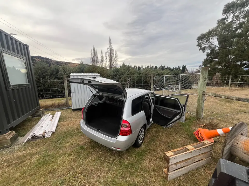 Rear of the wagon with the tailgate raised