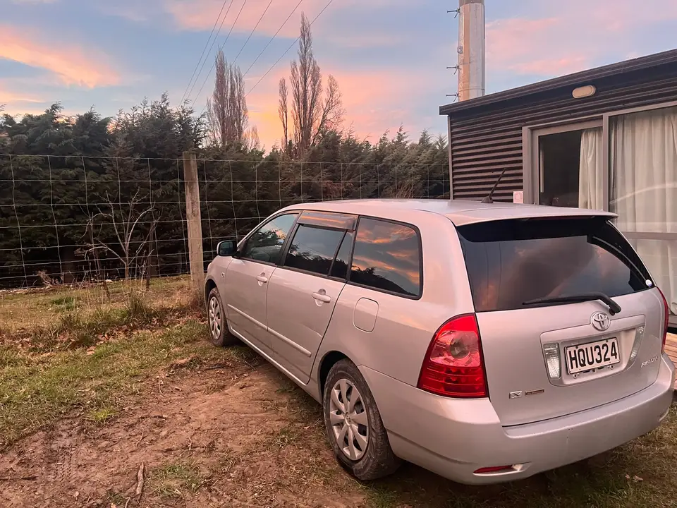 Rear three-quarter view in evening light