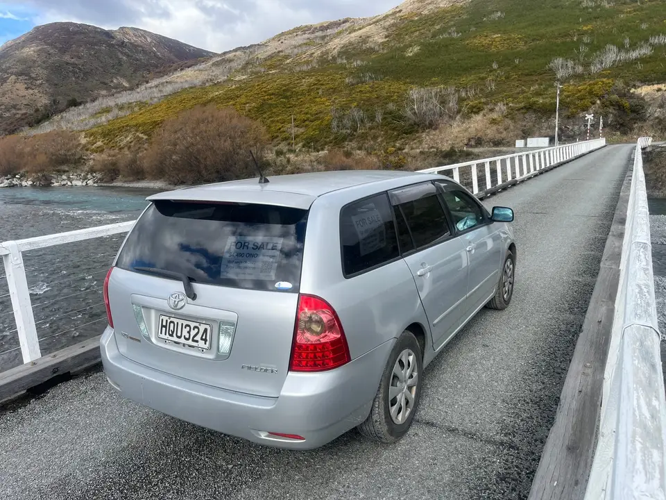 On a one-lane bridge over the river