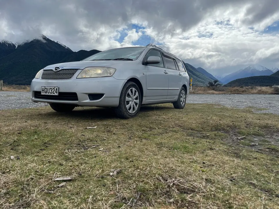 Parked on gravel flats below the Southern Alps