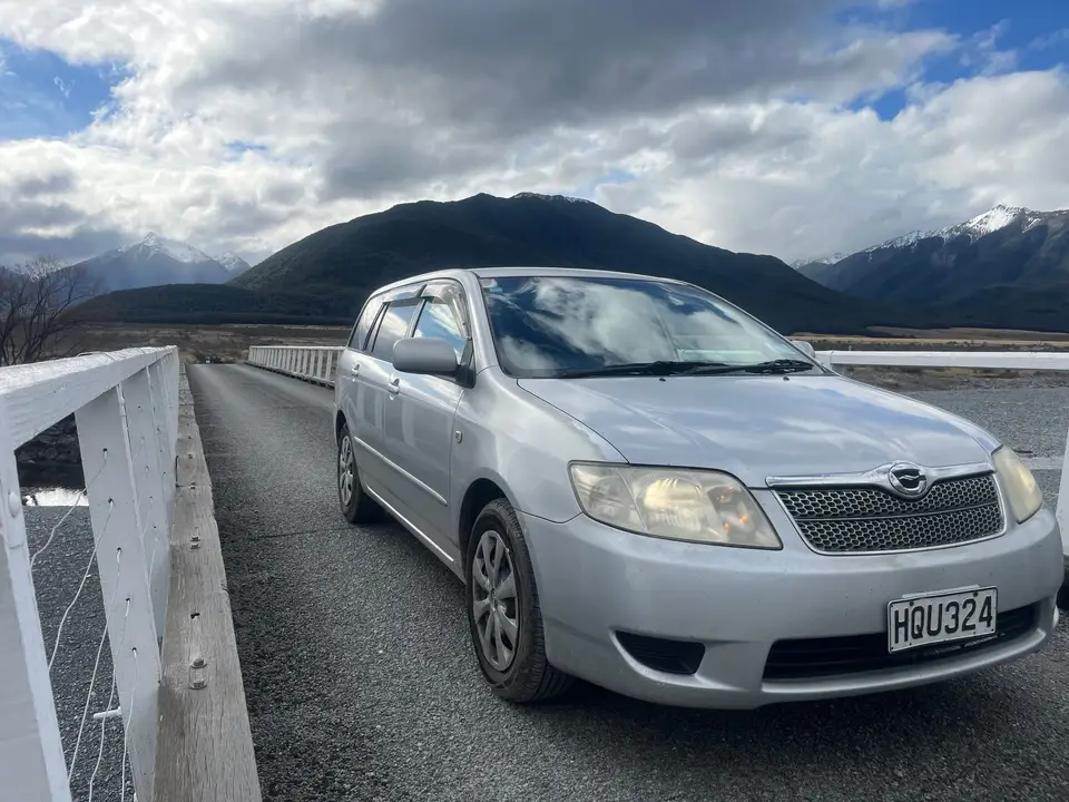 On a one-lane bridge with the ranges behind