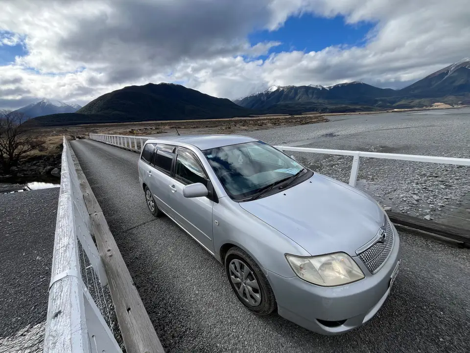 On a one-lane bridge with the river below